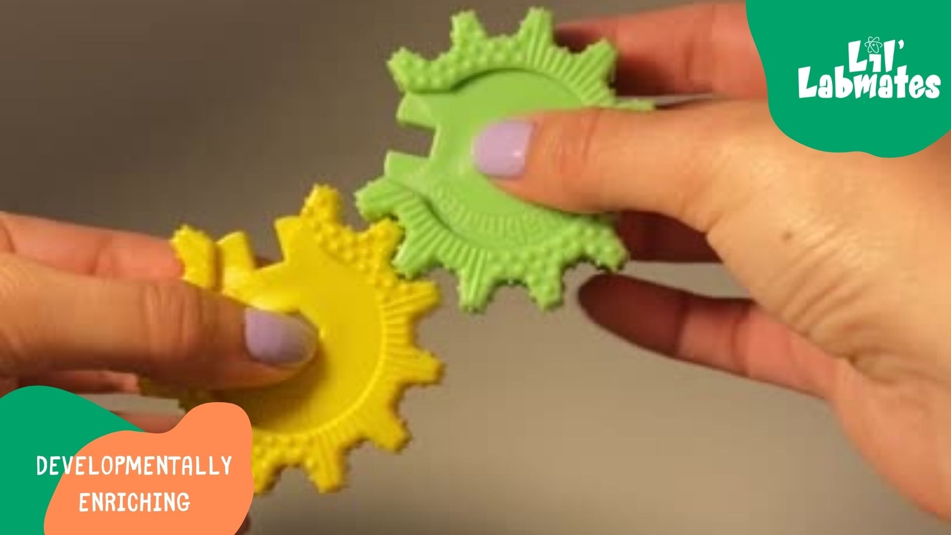 Load video: Wondering what developmental skills a baby can practice with the Interlocking Gears? Hand to hand passing, open grip, visual and auditory tracking, fine motor skills, and coordination